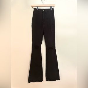 high waisted black ripped flare jeans